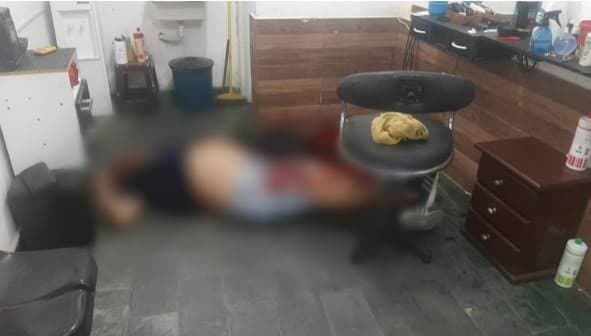 Jovem é morto a tiros dentro de barbearia